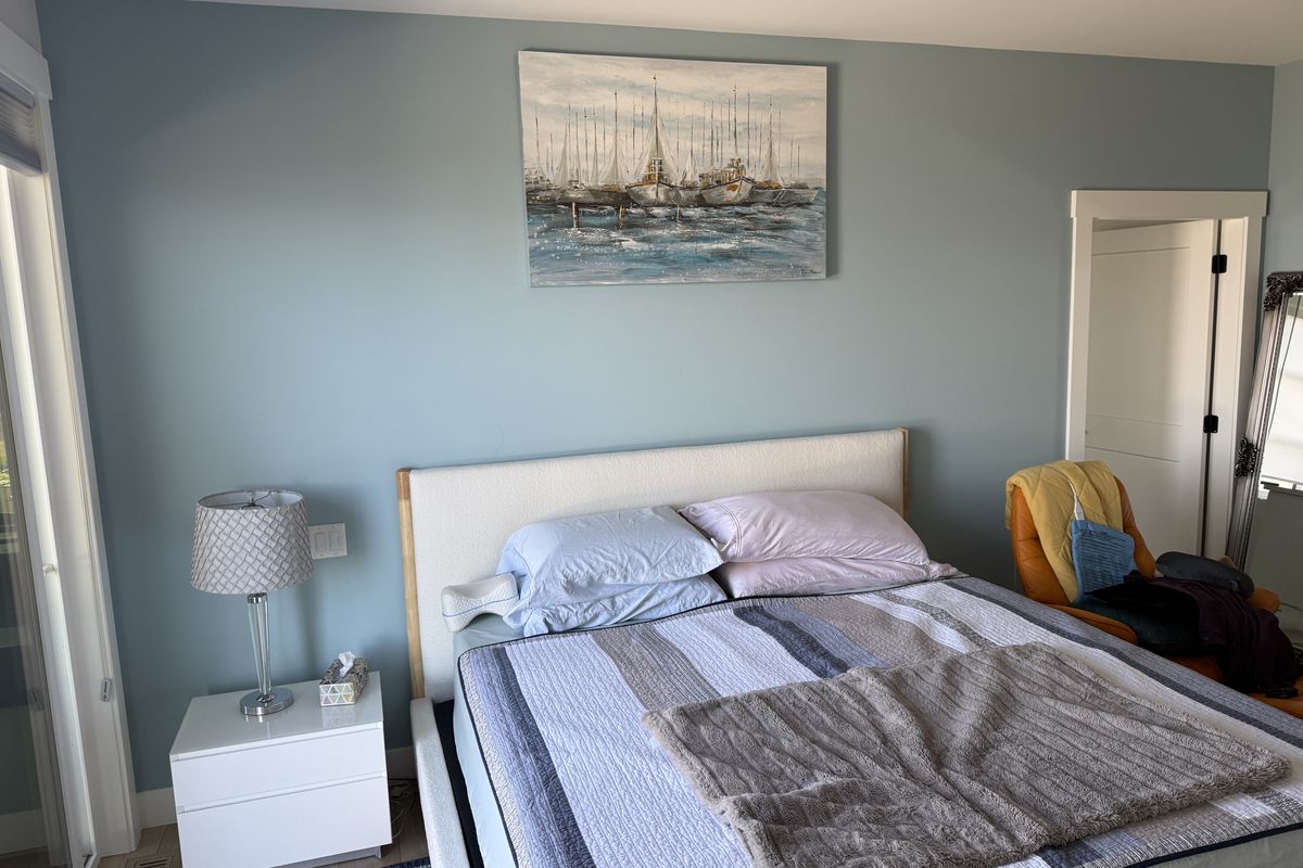 Bedroom wall before — painted accent wall